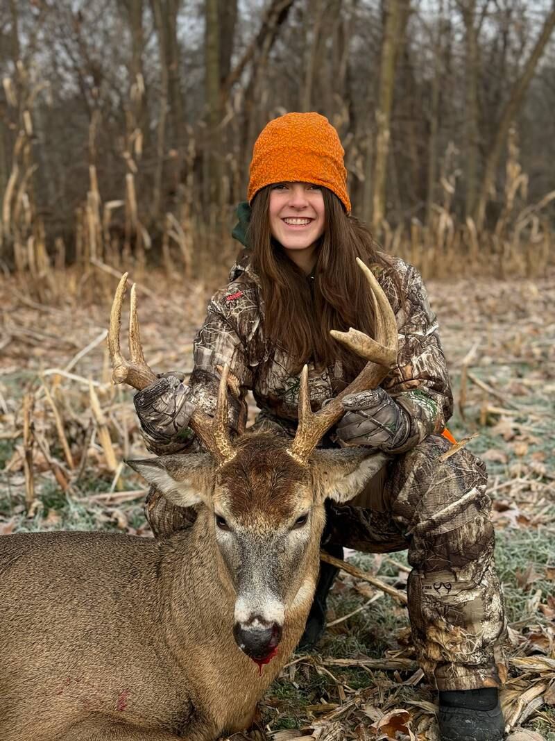 Aubrey,  age 15, of Lake Mitchell Cadillac, got her first buck, an 8 point, in the same field in Adrian that her father got his first buck